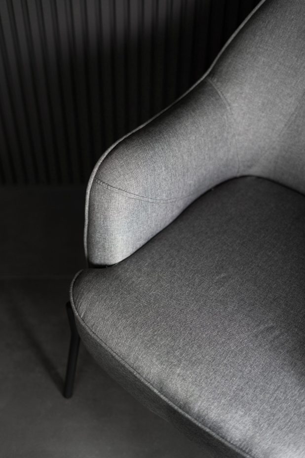 contemporary design of soft chair with textile upholstery and comfort back, stylish furniture at home, above view